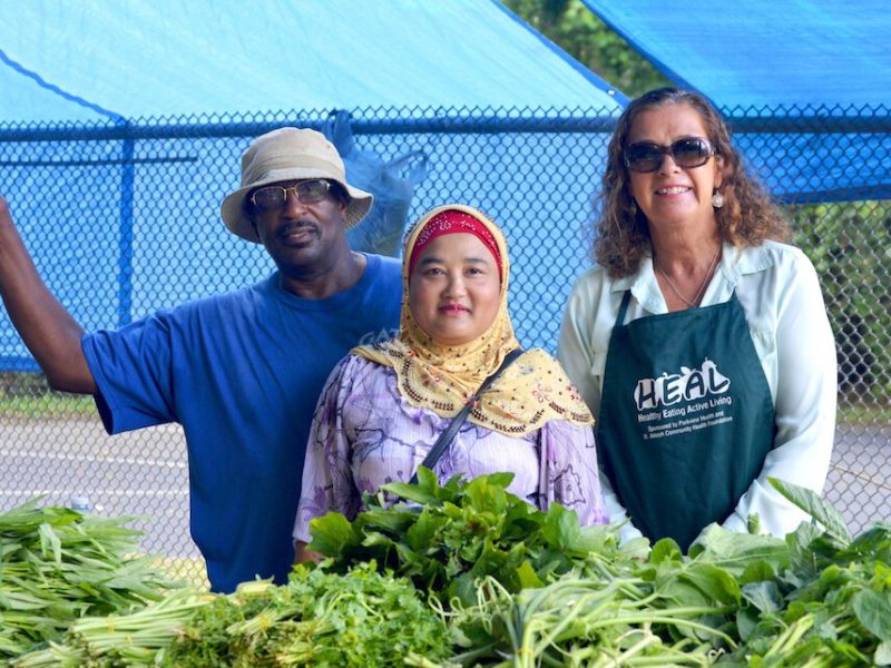 Gonzalee Martin, left, and Laura Dwire, right, partner with local growers like Mar De Nar, center.