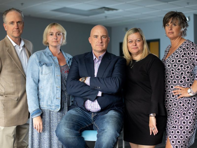 Jim Wilcox, center, and his team at Sandler Performance Center of Northern Indiana.