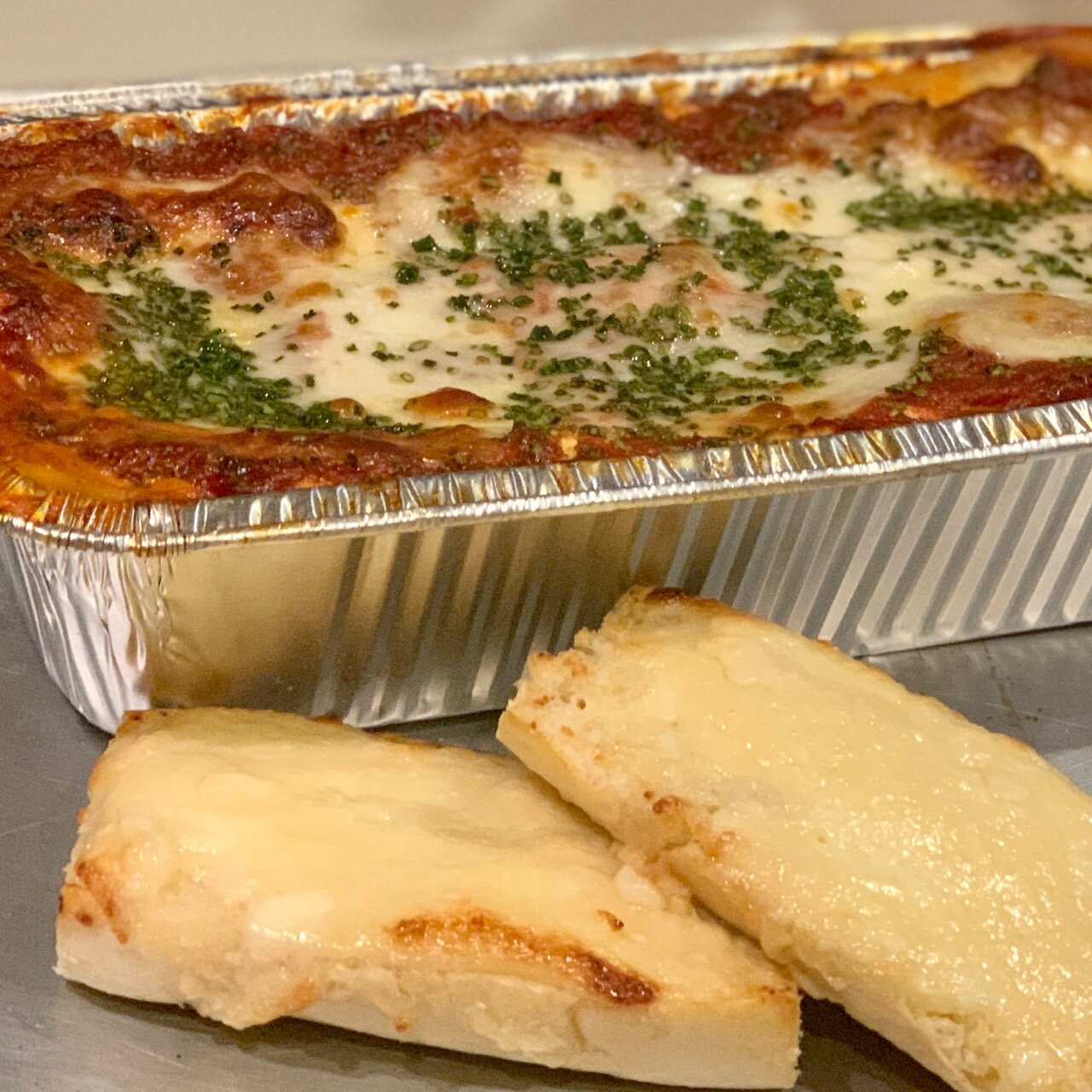 Joseph Decuis is now offering family style carry out meals designed by its chefs, like a "Knock Your Sox Off" Wagyu lasagna.