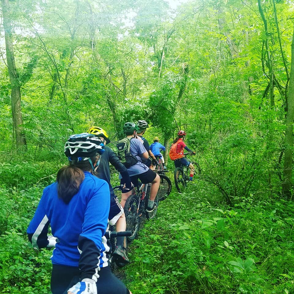 Parents and adult leaders chaperone rides for the NEIC Trailblazers.