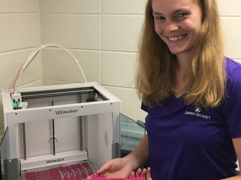 Erin Lawhon and other Grace College students are 3D printing ear guards for frontline workers wearing COVID-19 masks.