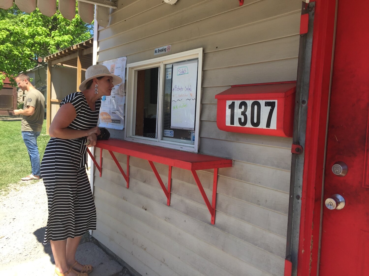 Sarah Hooley with City Church orders rib tips at Big Momma's Kitchen.
