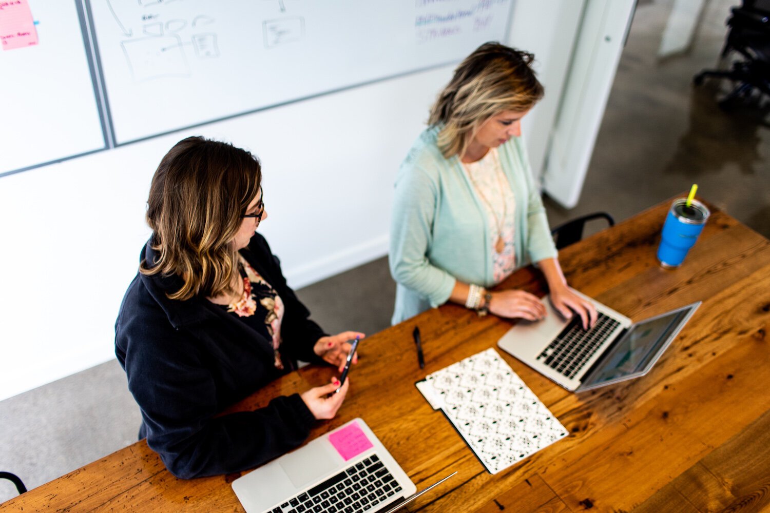 The team at Reusser Design works in their Roanoke office before COVID-19.