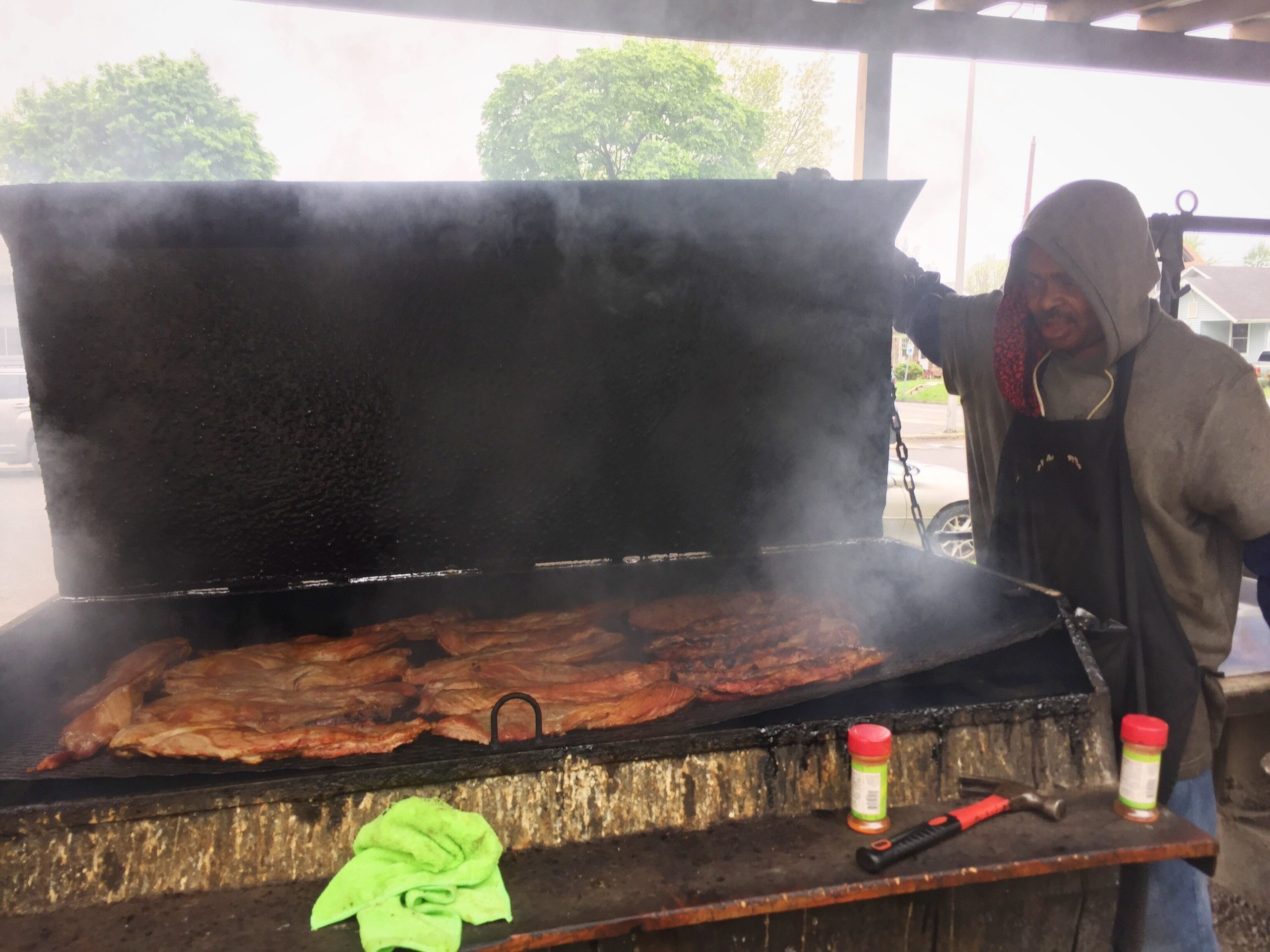 Turkey tips sizzling on a patio grill at Big Momma's Kitchen.