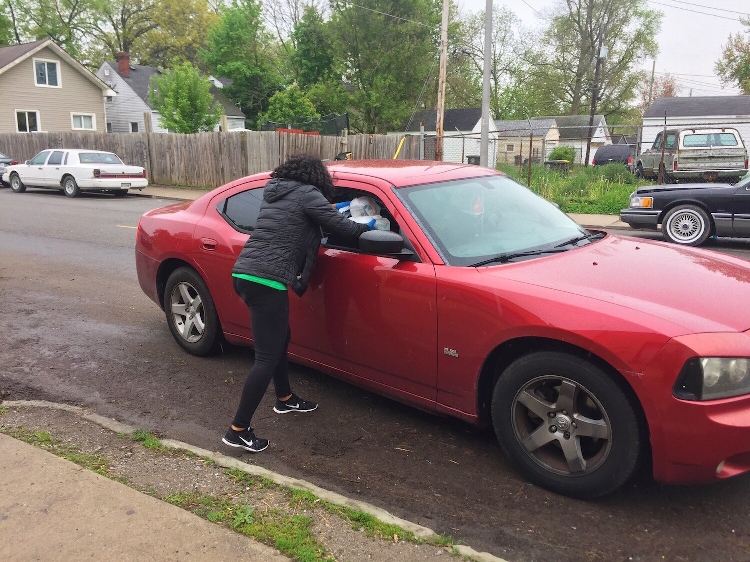 After three Curbside BBQs, volunteers have distributed more than 1,000 meals.