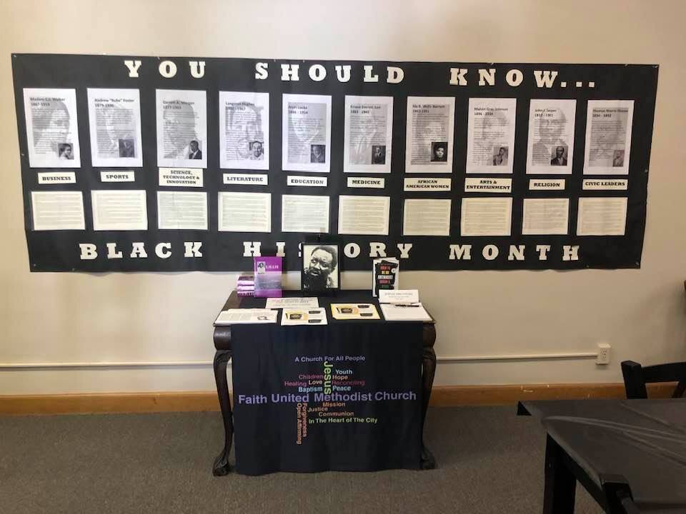 A booth on black history at Faith United Methodist Church.