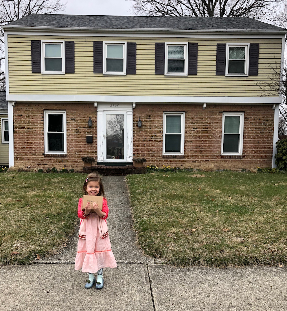 Olinger's daughter, Eleanor, makes a delivery.