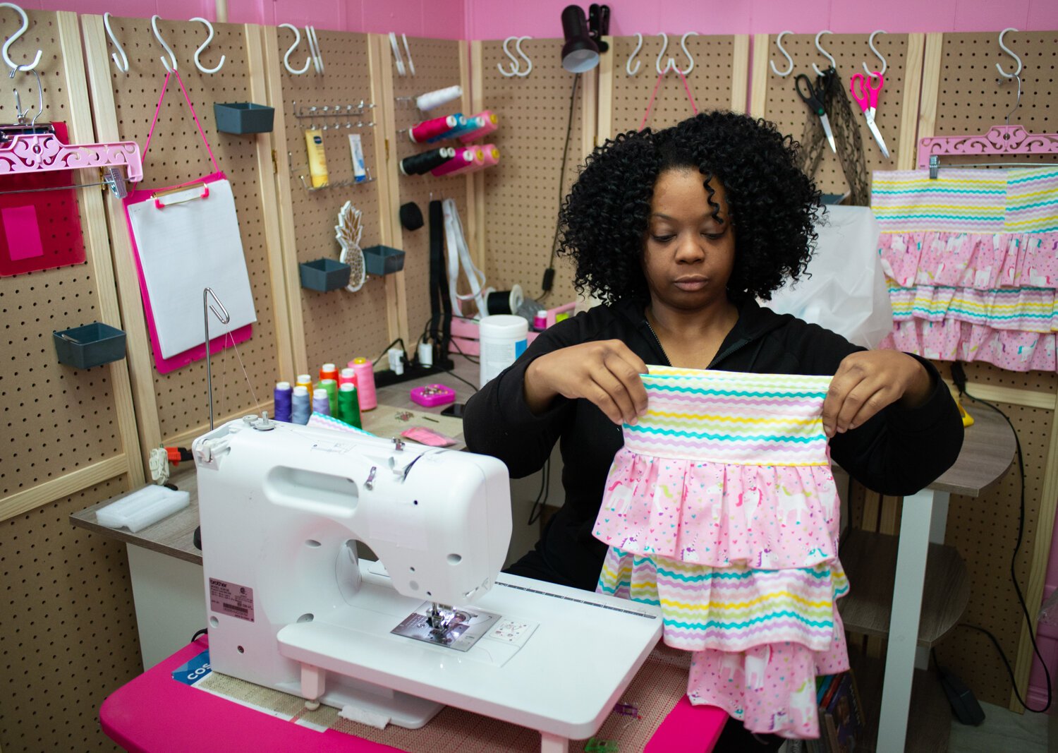 Pinky works on a garment at her shop at 2320 S. Calhoun St. (Photo series by Rachel Von Stroup)