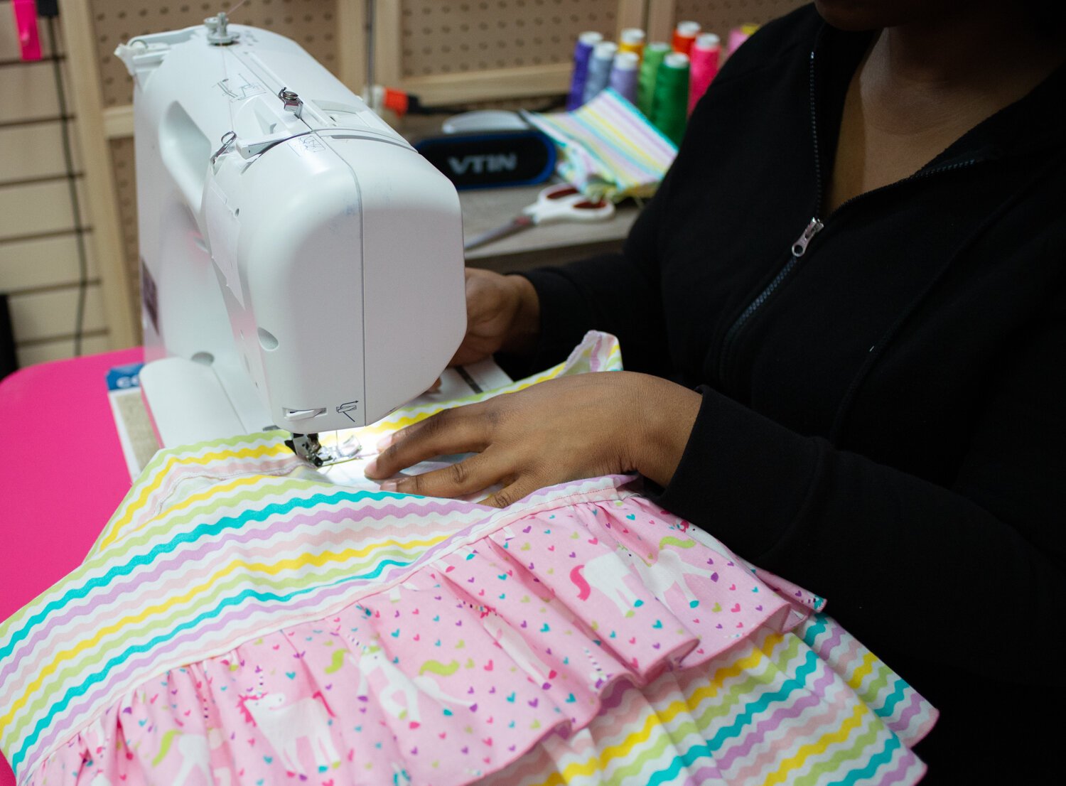 Pinky uses bright colors and princess patterns for her clothes.