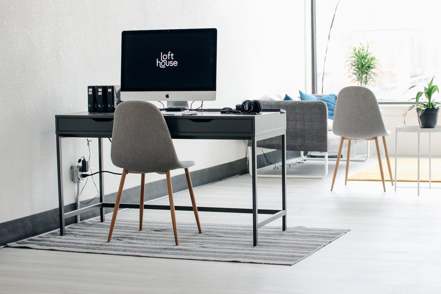 Workstations line the wall inside Lofthouse's office.