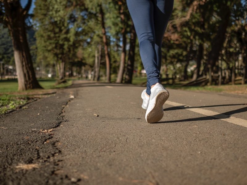 Take a walk or jog to get exercise, and pick up litter in your neighborhood along the way.