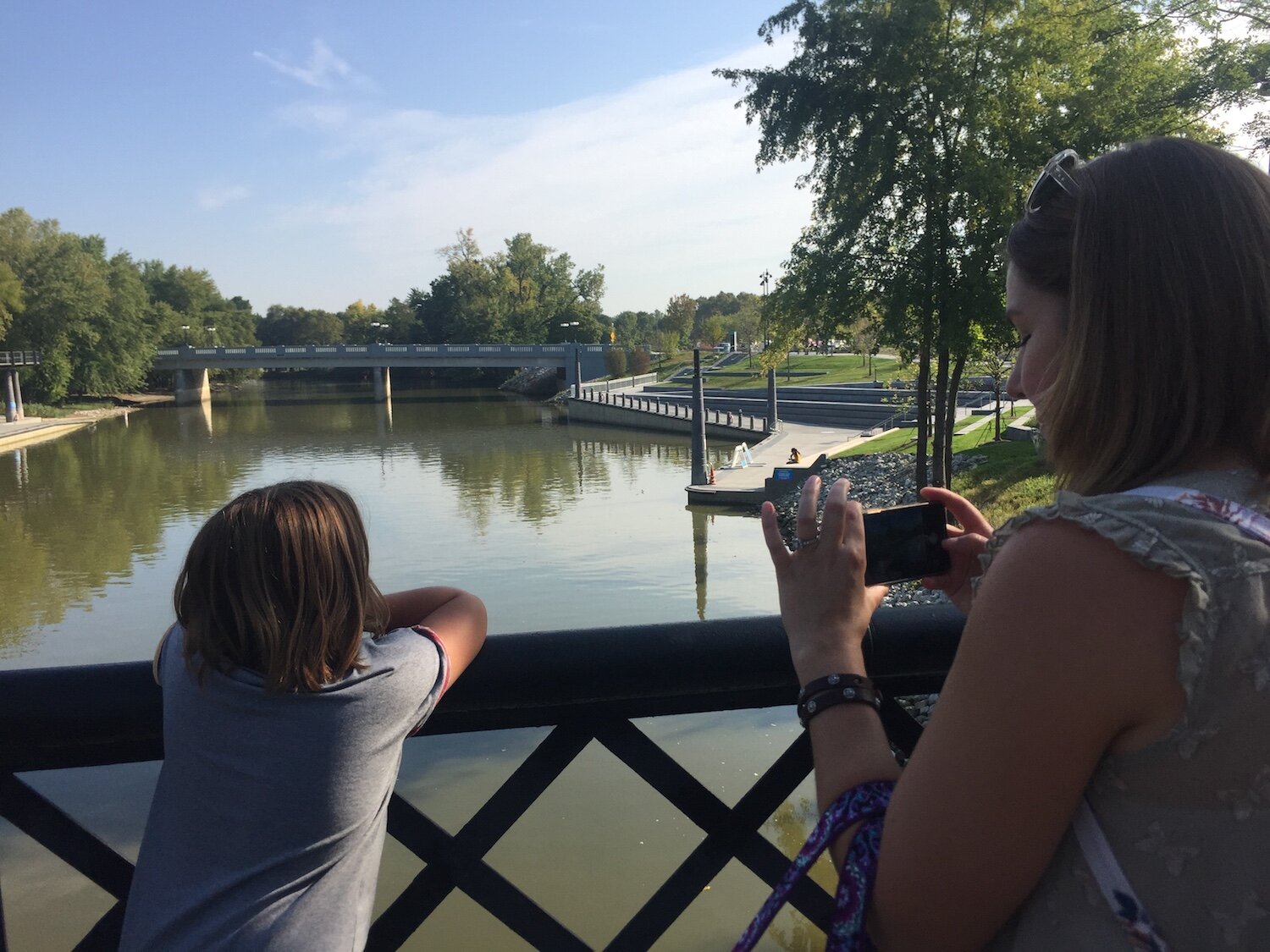 Blogger Abigail Hake Kellermeyer of Indianapolis snaps a photo during a travel writers tour of Promenade Park.