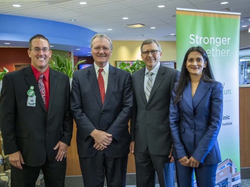 Parkview Heart Institute COO, Mike GeRue, left, attends the announcement of its Affiliation with the Cleveland Clinic Heart & Vascular Institute.