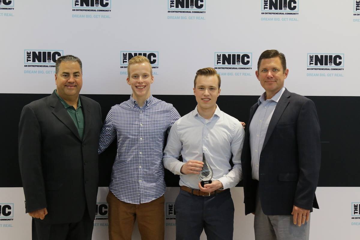 Nathan and Mitchell Skees, center, are brothers and high school students who used the NIIC’s services to grow their company 3B Apps. 