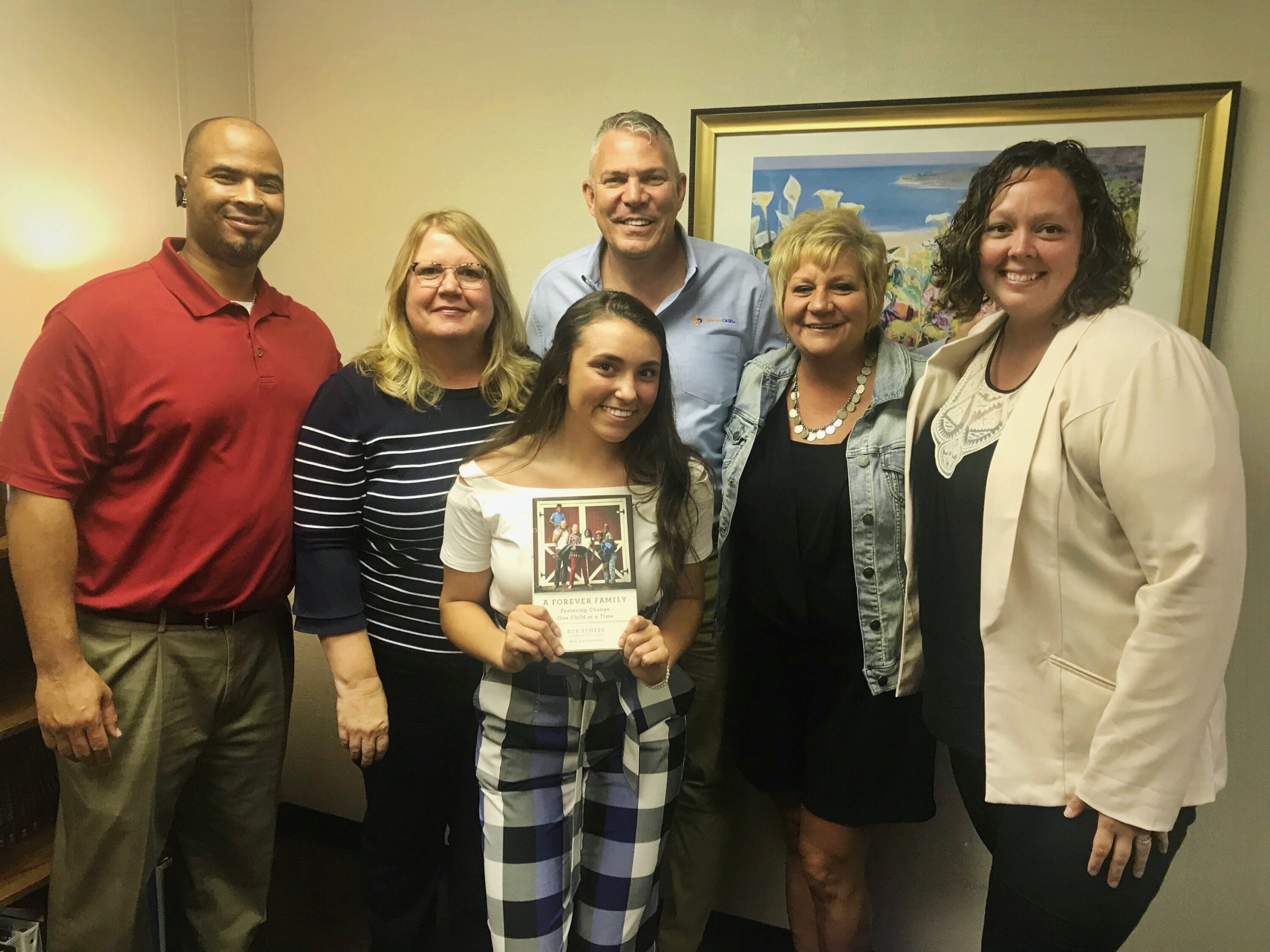 Brown, center, is working to bring Comfort Cases to foster care children in northeast Indiana.