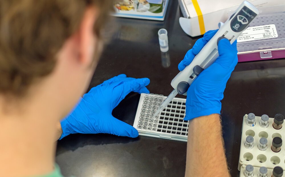 Student Jed Harvey tests water quality samples in Kosciusko County.