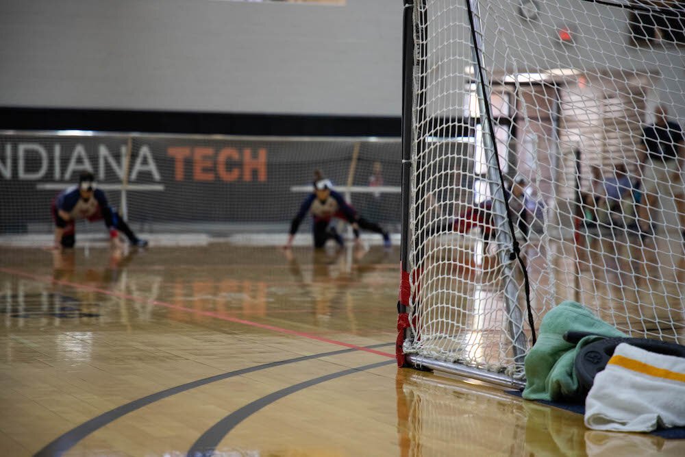 Goalball is played on a volleyball court with soccer-like nets.