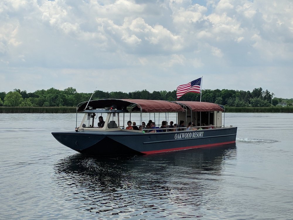 The Oakwood Resort boat was originally custom-built as a U.S. Parks Department canal boat.