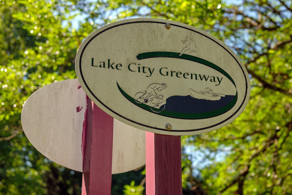 The KC Velo Club trails connect to the popular Lake City Greenway.