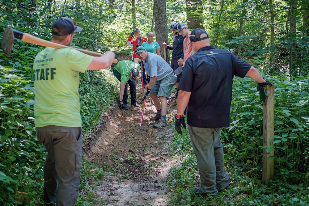 KC Velo Club members volunteer their time on weekends to maintain the trails.