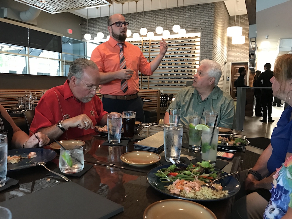 Staff at Proximo tells the Food Tour about the restaurant's focus on Latin faire.