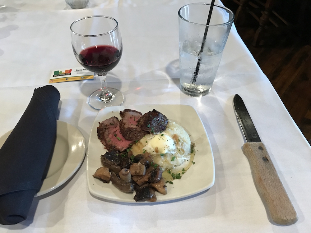 The Food Tour starts at Halls with a plate of filet minion, sautƩed mushrooms, and mashed potatoes with garlic butter as well as a sampling of red wine.