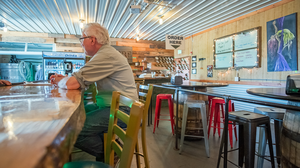 HopLore Brewing offers a spacious modern bar and dining area.