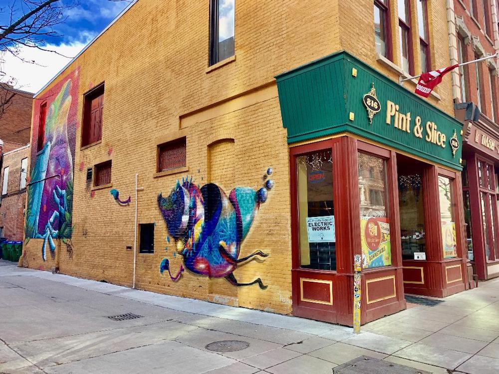 There's a mural by the famous artist Yis Goodwin on the side of Pint & Slice.