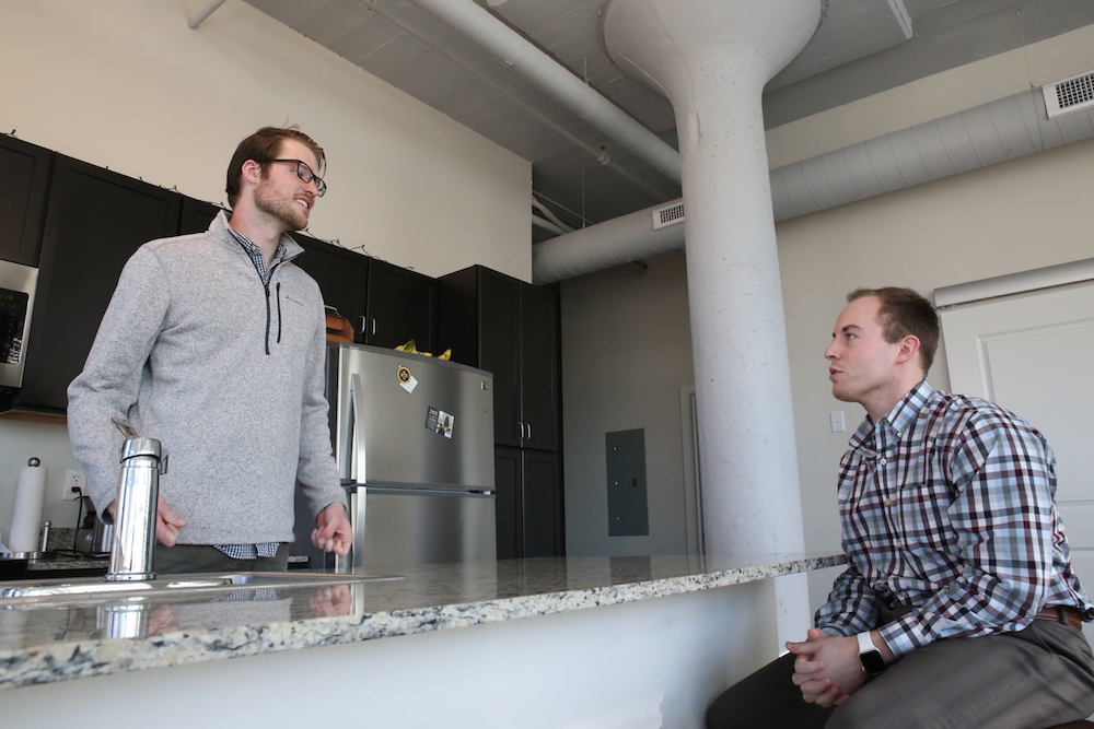 Brad Hartman, left, and his roommate, Derek Lamle, at Superior Lofts.