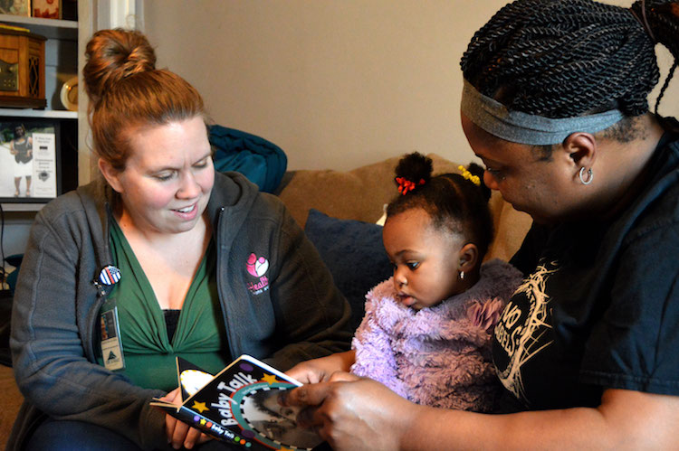 Healthier Moms and Babies Case Manager Ashley Nichter with Sa’nia Winder and Shannon Winder, right.