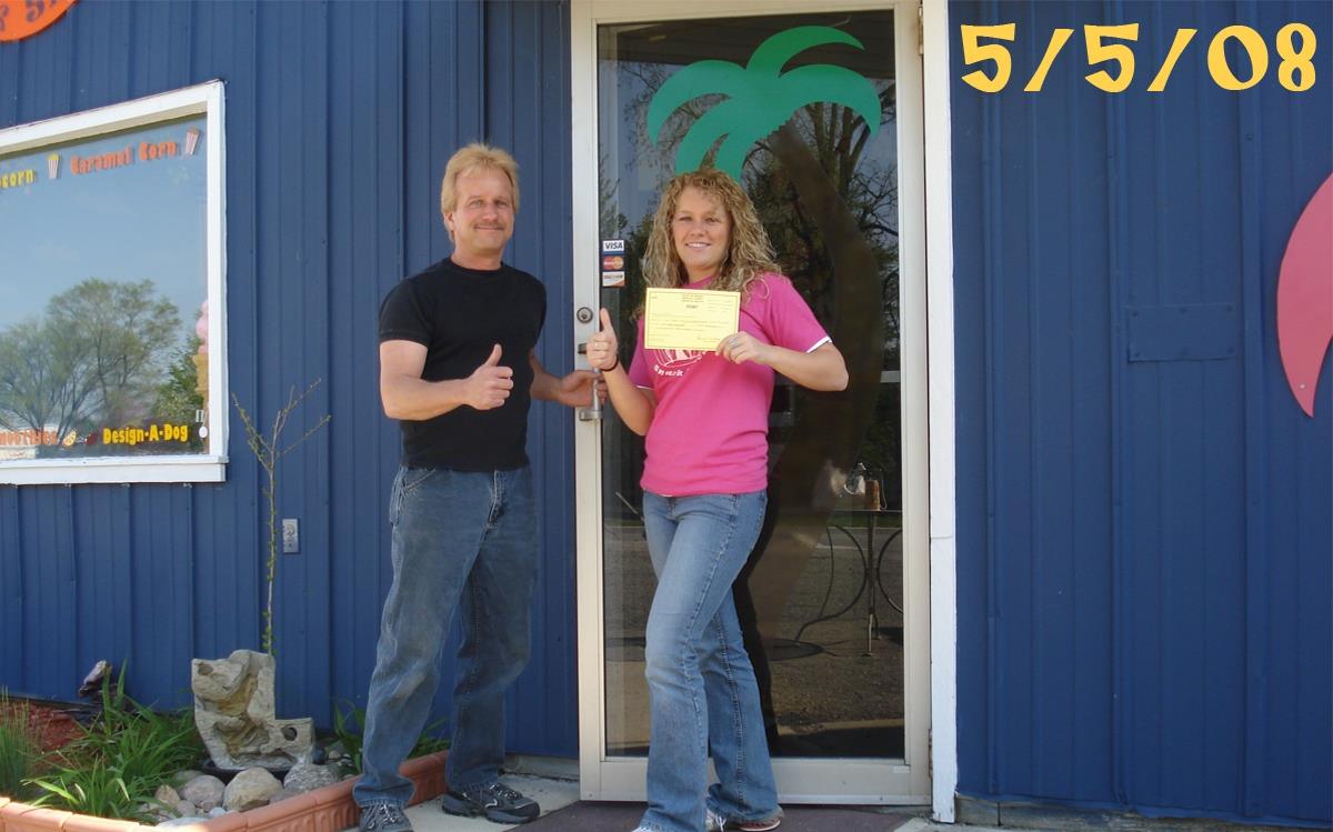 Gary and Lindsey Hively outside their first snack shop in Columbia City.