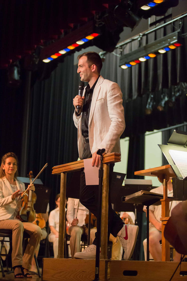 Young leads the orchestra's Musically Speaking preconcert discussions.