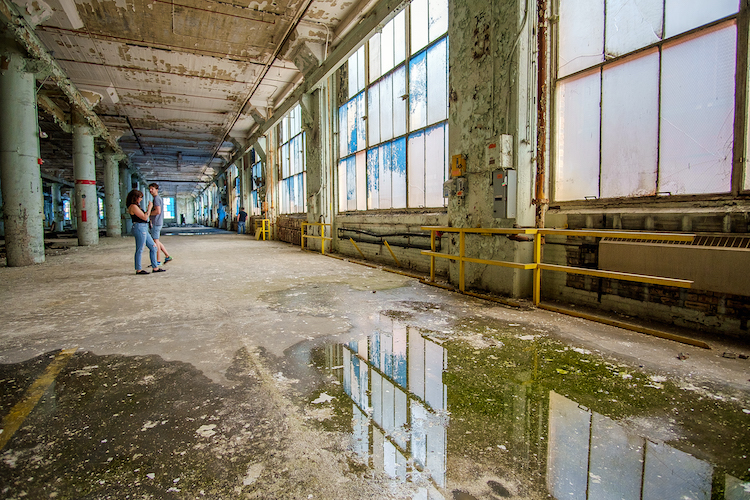 Tour groups explore the old General Electric buildings.