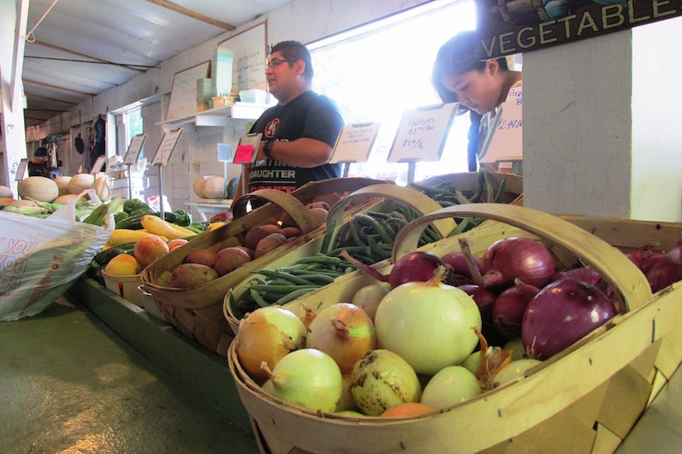 The Fishburns sell fresh produce at the Southside Farmers Market.