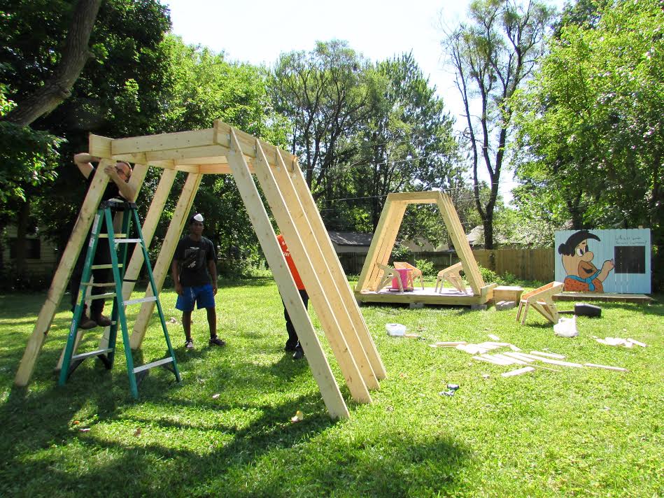 Full-scale prototypes of campers' original designs for community spaces fill a vacant lot in Mount Vernon Park neighborhood.