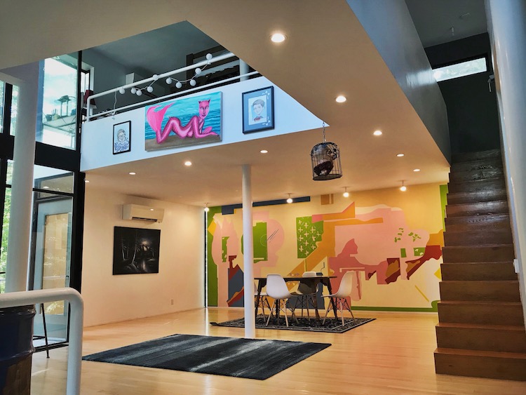 Mulvihill added an eclectic mix of local art to the second storey of the house.