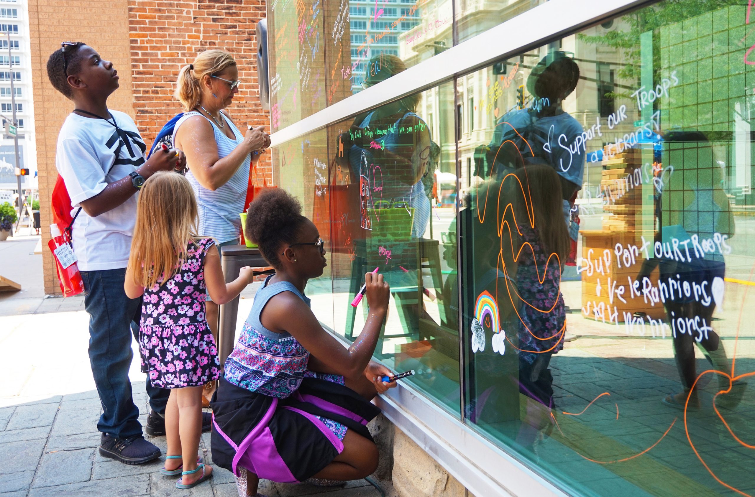 Part of rethinking public spaces is decorating downtown buildings.
