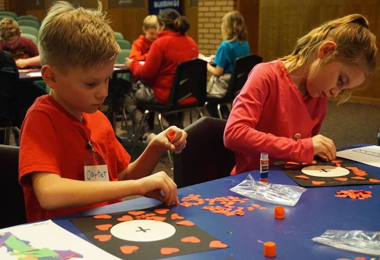 Children participate in arts and crafts programs at Trinity English.