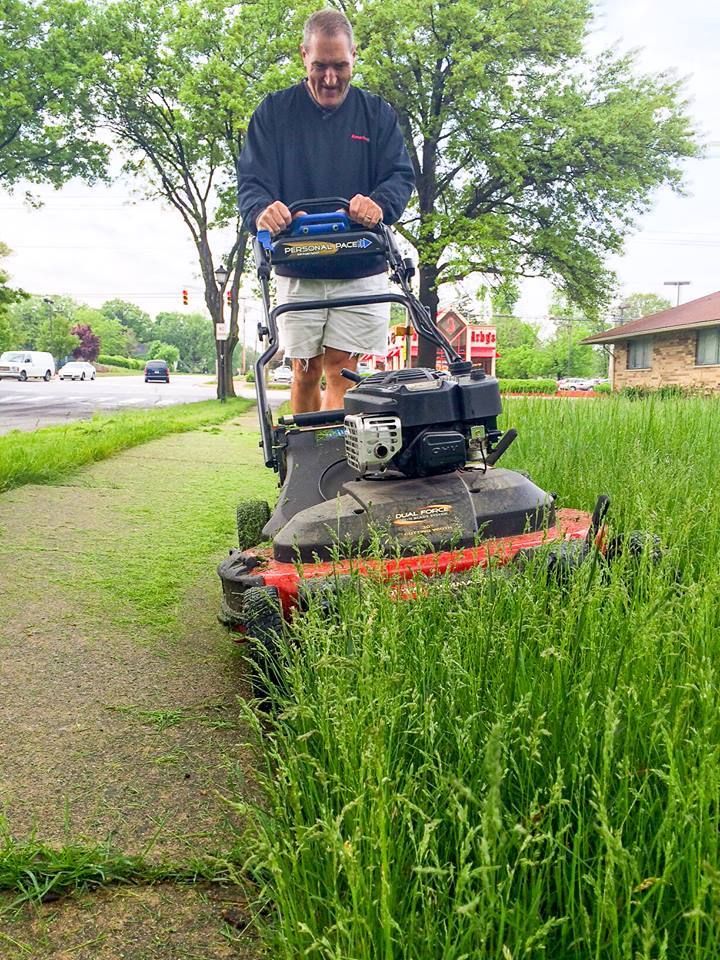 A simple act of kindness like mowing someone else's lawn can make a big difference.