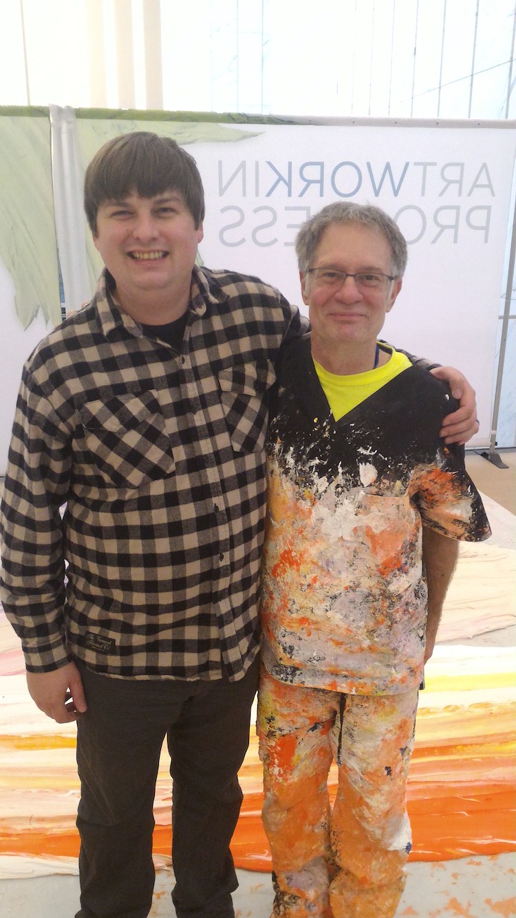 Donald Martiny, right, painted an art installation in the lobby of World Trade Center One.