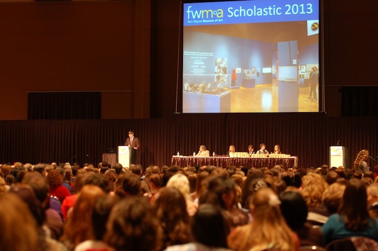 Meyer presents at the Scholastic Award Ceremony.