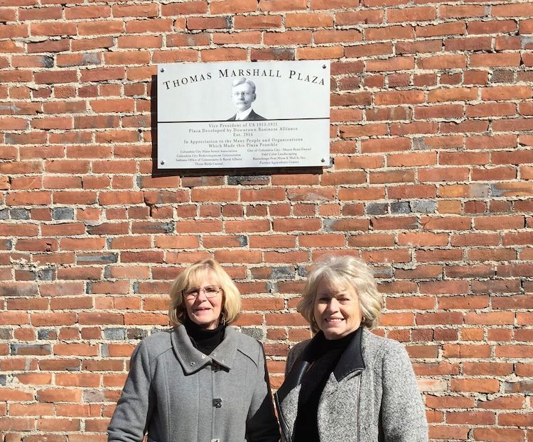 Sharon Geiger (left) and Ann Fahl in Thomas Marshall Plaza which they helped create.