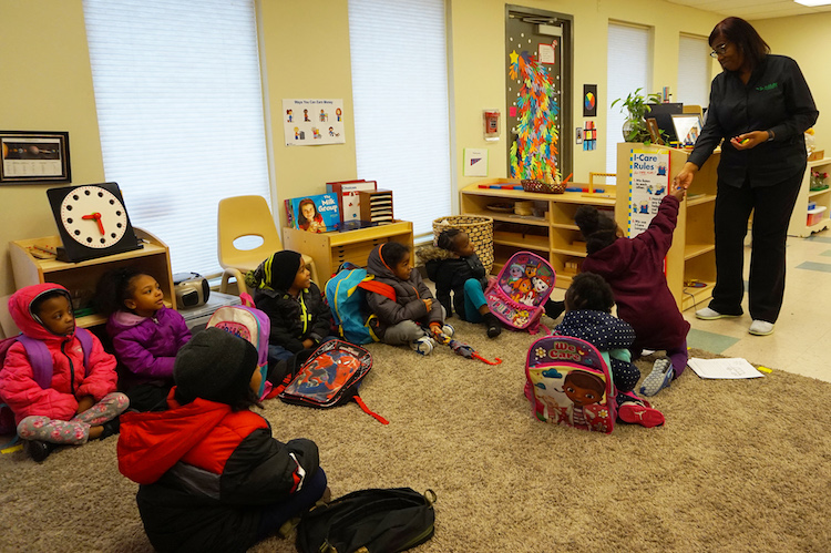 McKinney, right, teaches at MLK Montessori School.