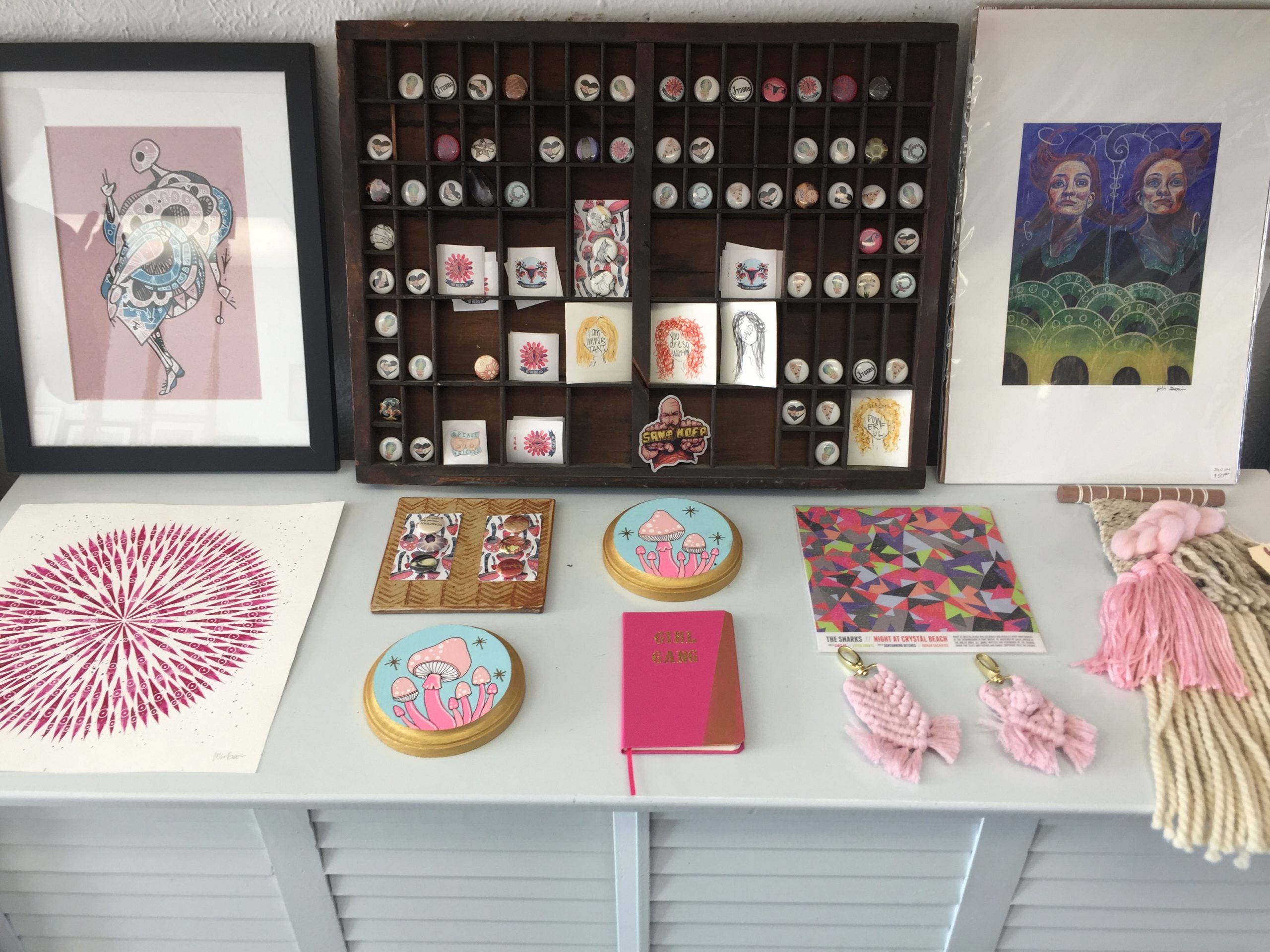 Brown's partner, Lissa, sells her Tiny Clementine Art at the shop.