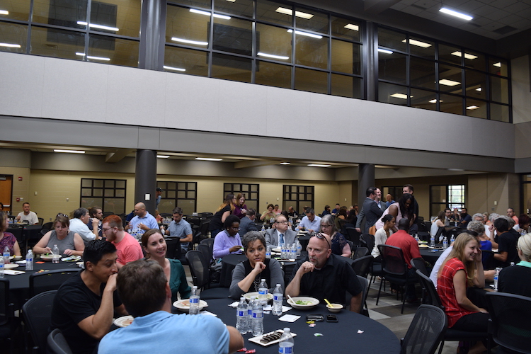 During dinner, attendees discuss and vote on their favorite ideas.