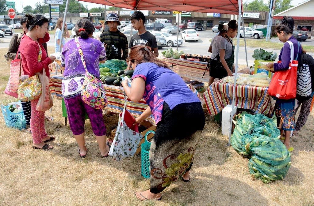 Shoppers browse the selection at the State Street Farm Market.