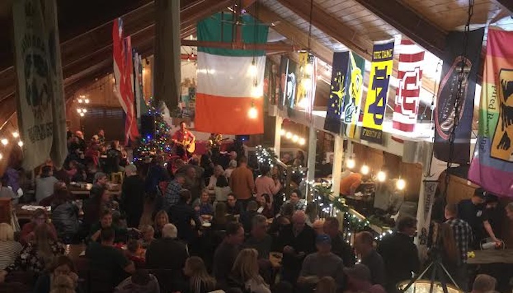 The beer hall at teds market is a popular hangout for large groups.