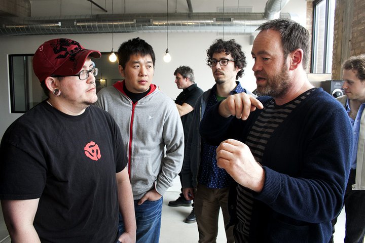 Wang, second from the left, listens to 2009 World Barista Champion Gwilym Davies, right, at Counter Culture Coffee's Lab in Chicago.