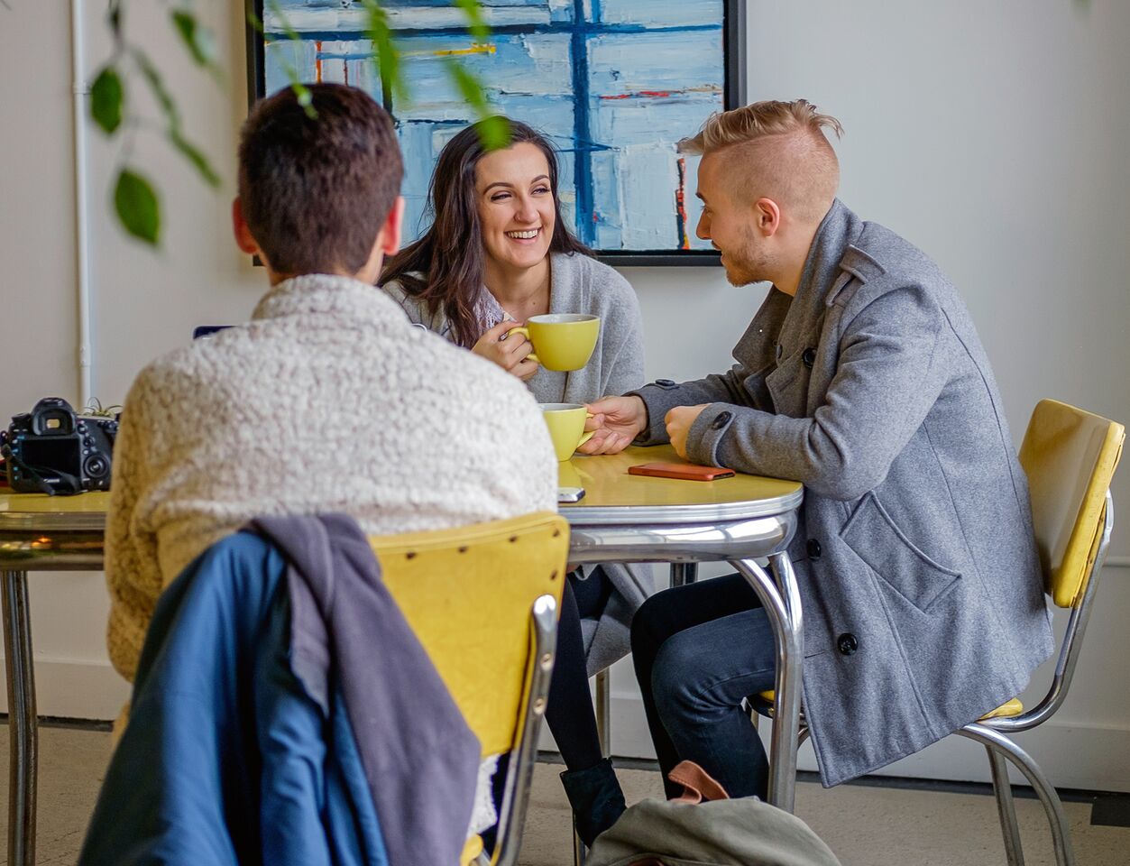 Customers hang out at Conjure Coffee on the Northeast side of downtown.