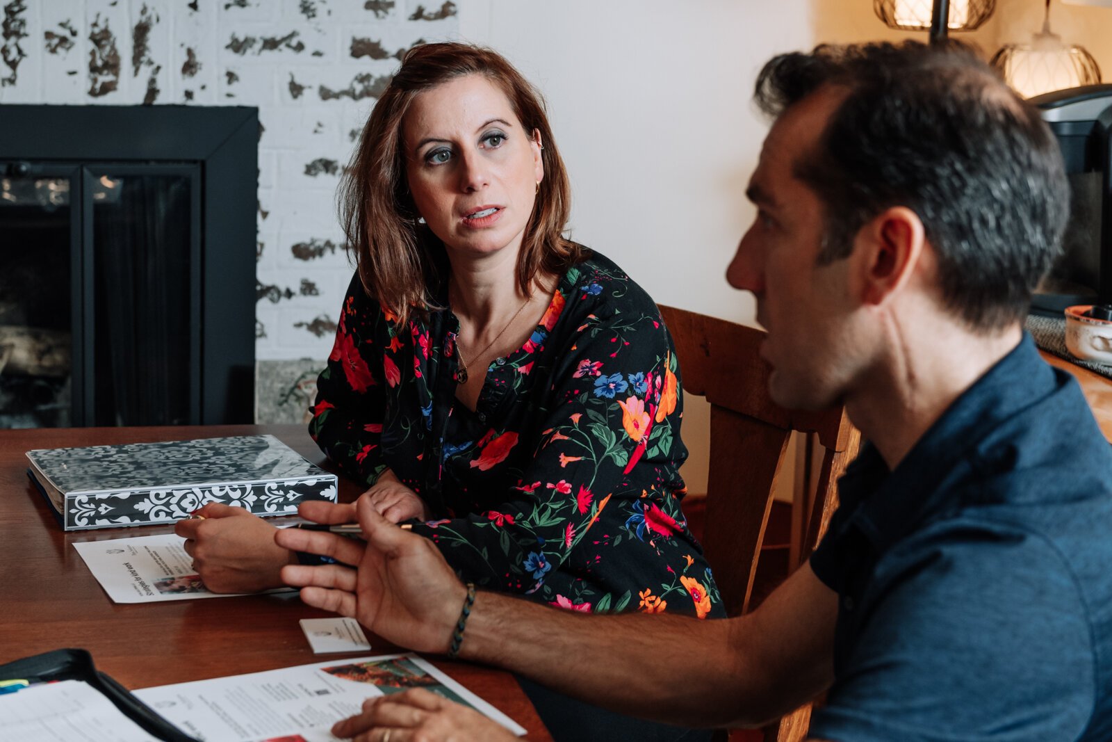 Irene Paxia, left, and her husband, Andrew Applegate, run the consulting firm Petra Solutions from their home, helping companies improve cross-cultural, fundraising, and business strategies.